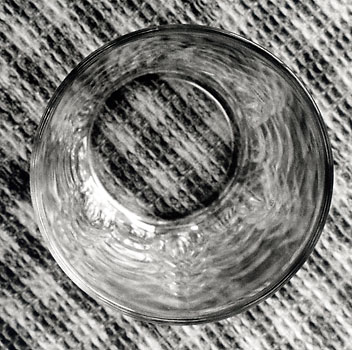 A glass. Inside the cover, right (beneath the cd)